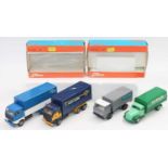 A small box containing 3 unboxed Tekno trucks and 1 Lion Toy DAF delivery truck, plus 2 empty