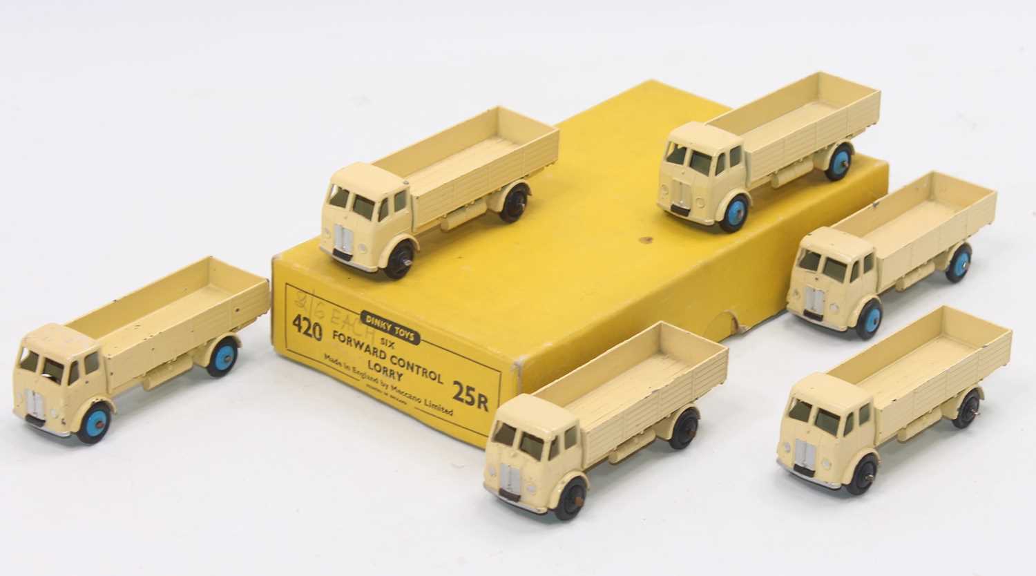 Dinky Toys 25r original Trade box containing 6 "Forward Control" Lorries in cream 3 with blue hubs