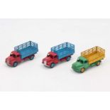 Dinky Toys 343 group of 3 "Farm Produce wagons" 2 in red and blue and 1 in green and yellow all