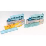 A pair of boxed Dinky Pullmore car transporters as follows 982 with dark blue cab and an all light