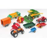 One small box of loose Britains Farm machinery which includes a large "Corn King" combine and many