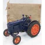 A Chad Valley large scale Fordson diecast large scale tractor, comprising of dark blue body with