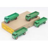 Dinky Toys 25r original Trade box containing 4 "Forward Control" Lorries all in green 1 with green