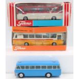 2 boxed Tekno coaches and 1 unboxed as follows: Mercedes Benz in "PTT" livery and a plain red and