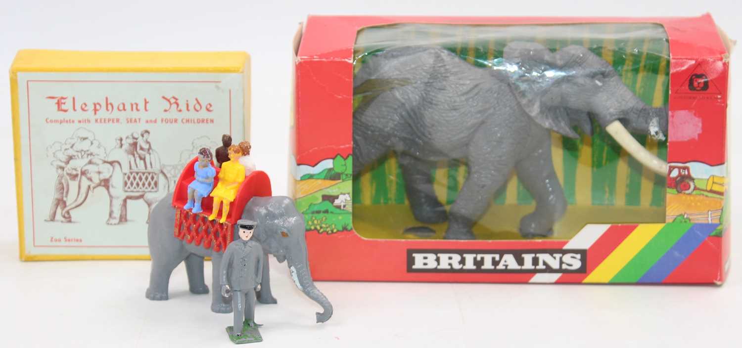 A Britains plastic 1309 African Elephant in a red window box plus a boxed Elephant Ride set, seems