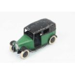 Dinky Toys, No.36g Pre-war Taxi, green body, black chassis, open rear window, smooth black cast