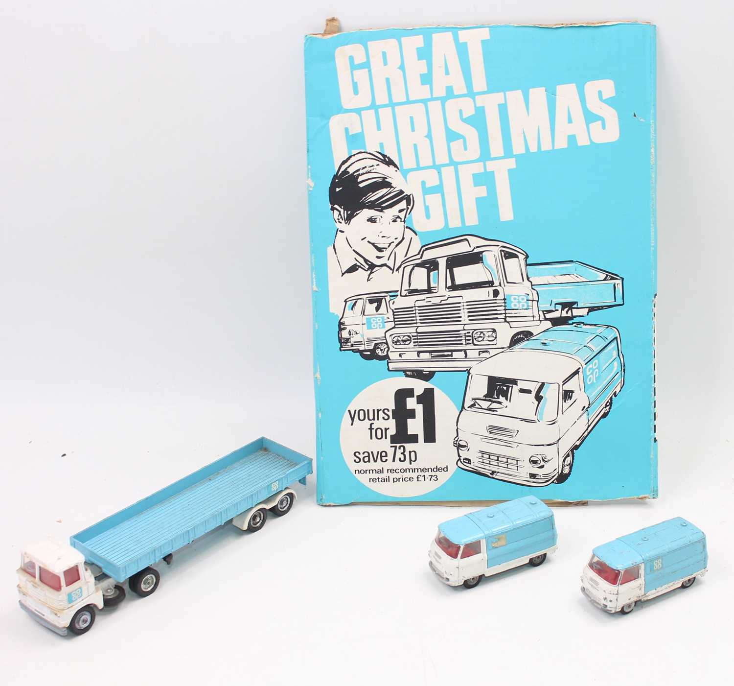 An original 1960s Corgi "Co-Op" Christmas gift set advert card and 3 models, includes Scammell