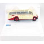 A boxed OC Original Classics Bedford Duple OB, red and cream body in “West Yorkshire” livery in 1: