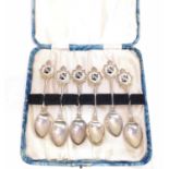 A solid silver and enamel set of 6 military teaspoons, with crest for the North Western Railway of