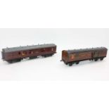 Two bogie coaches: Leeds Model Co, bakelite LMS br/3rd no.8512, some damage to glazing (VG);