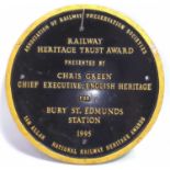 A cast metal Railway Heritage Trust Award for Bury St Edmunds station 1995, presented by Chris Green