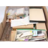 A large box of components, parts, unfinished projects etc, from a model maker's workshop,