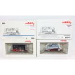 Two Marklin HO 0-6-0 tank locos: 33043 80 030 grey & red (M-BM) with 3404 D -727 black & red (M-BM)