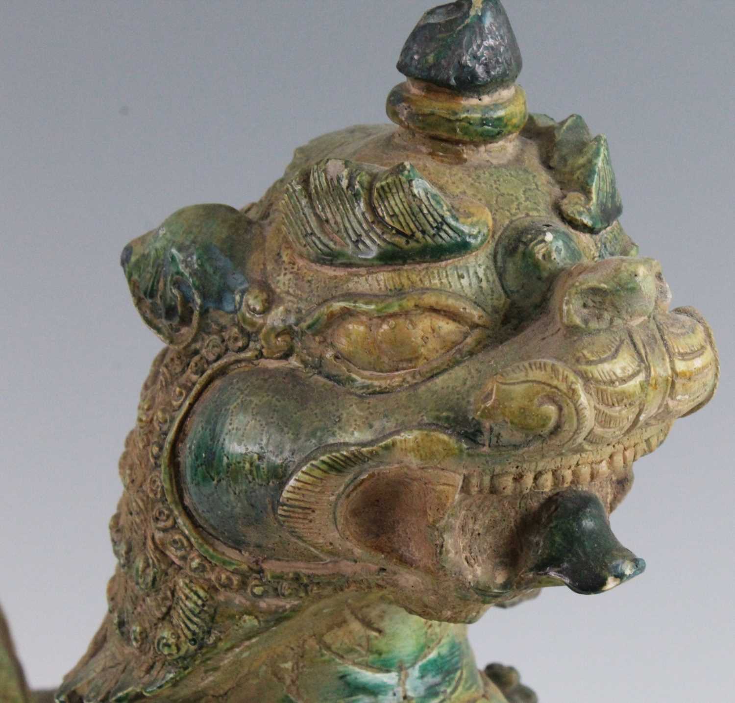 A Chinese green glazed pottery figure of a Fu Lion, modelled in proud standing pose, mounted on a - Image 4 of 12