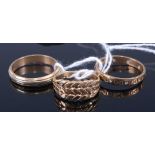 Two 9ct gold band rings; together with a yellow metal ring, gross weight 8.3g (3)