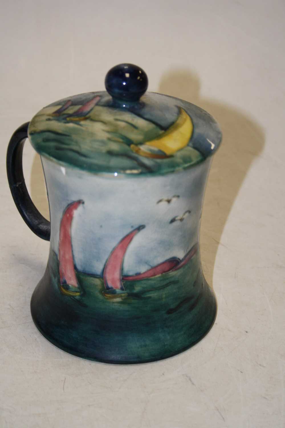 A Moorcroft Pottery lidded mug of waisted cylindrical form, tubeline decorated in the Bermuda - Image 3 of 6
