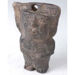 A talismanic hollow form double sided figure in standing pose with impressed decoration, Mayan