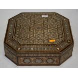An Eastern box, of octagonal form, having Vizagapatam style parquetry inlaid decoration, w.33cm