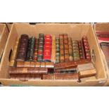 A box of 19th century and later leather bindings, to include Historical Essays by Freeman, and