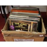 A box containing a collection of various LPs, to include Tom Jones, The Sound of Music soundtrack,
