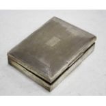 A 1970s silver table cigarette box of rectangular form having engine turned decoration and cedar