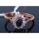 A 9ct gold blue sapphire and CZ set cluster ring, size Q, 1.9g