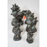 A graduated set of six bronzed metal weights each in the form of a mythical beast, height of largest