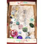 A collection of various glass paperweights to include Mats Jonasson Swedish clear and frosted