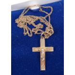 A 9ct gold crucifix pendant on finelink neck chain, 1.5g, in retailers box
