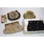 A collection of assorted lady's evening bags and purses