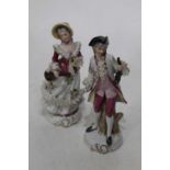 A collection of Continental porcelain figure groups and a further decorative basket (7)