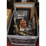 A box containing a collection of miscellaneous items, to include photograph frames, petwer