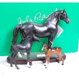A John Beswick of Royal Doulton model of a Welsh Cob Stallion, mounted on a plinth, h.24cm, boxed;