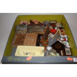A box containing a collection of various dolls house furniture and miniatures to include a pine