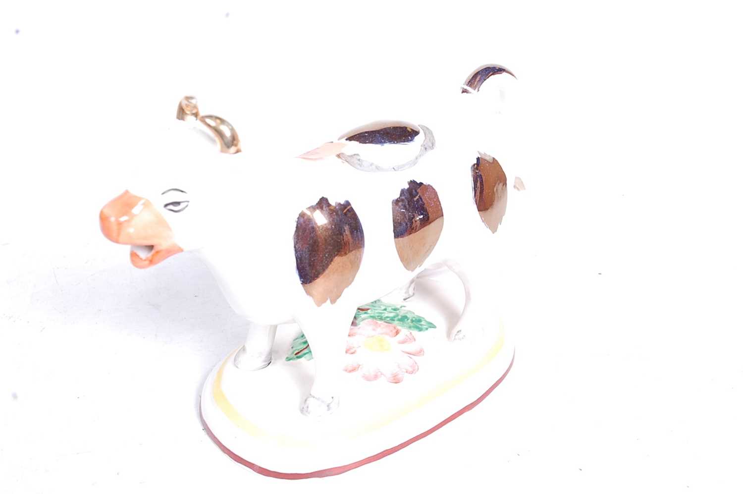 A Staffordshire pottery cow creamer; together with a pair of Staffordshire flatback figures; and - Image 5 of 8