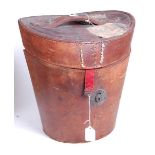 A Victorian tan leather top-hat box, with fitted red silk interior, h.34cm