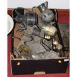 A box of pewter and silver plated wares to include trophies, teapots, and dishes