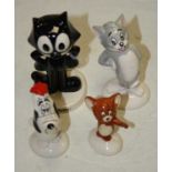 A collection of four John Beswick figures to include Tom & Jerry, Felix the Cat, and Droopy (4)