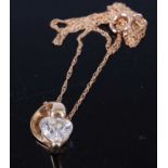 A 9ct gold CZ set pendant on fine link neck chain