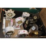 A box containing a collection of various mantel clocks, to include a Bohemian lead crystal quartz