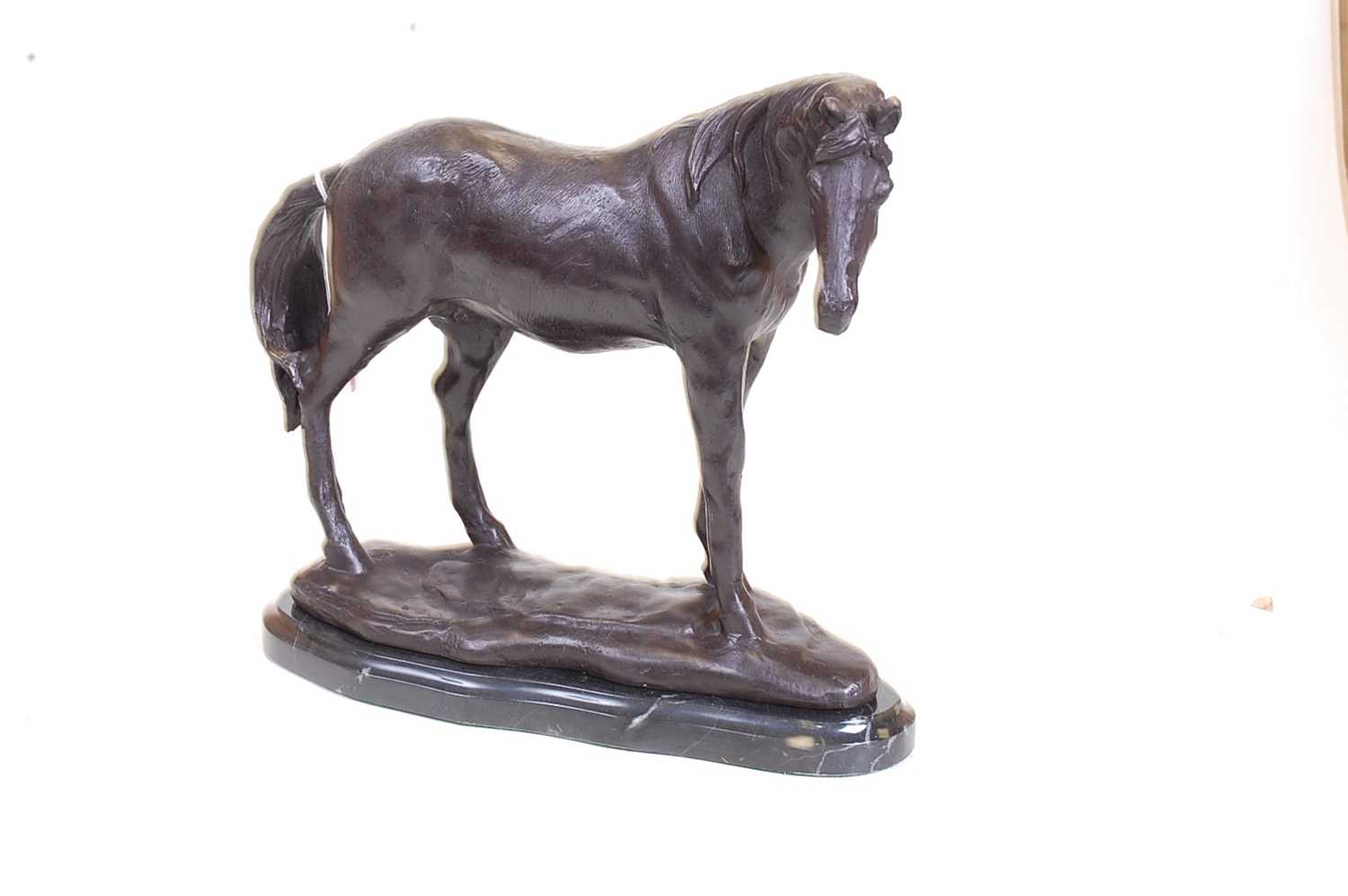 A bronze model of a horse, shown in standing pose, mounted upon a veined black marble plinth, h.23cm - Image 2 of 3