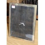 A George V silver clad easel photo frame of plain rectangular form, maker Sanders & McKenzie,