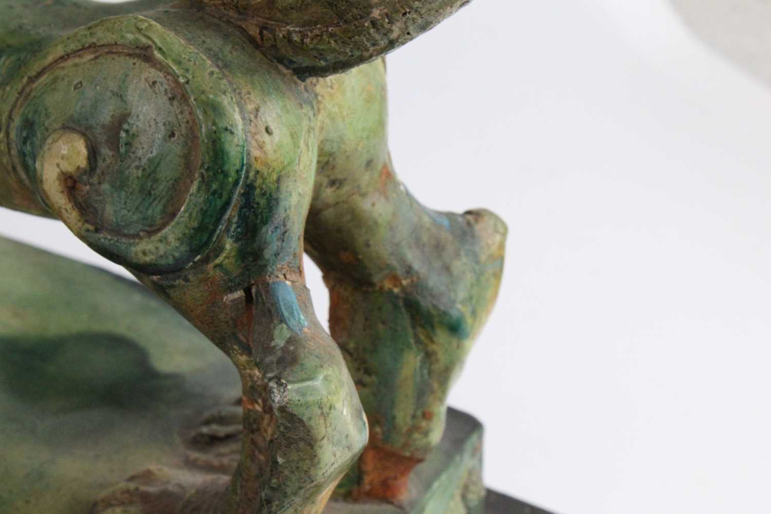 A Chinese green glazed pottery figure of a Fu Lion, modelled in proud standing pose, mounted on a - Image 12 of 12