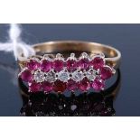 A 9ct gold ruby and diamond point set dress ring, 2.2g, size O/P