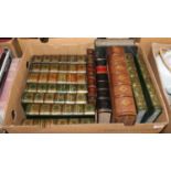 A box containing a collection of 19th century and later leather bindings, to include The Cambridge