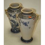 A pair of 20th century Japanese pottery urns, each decorated with blossom below a lancet border,