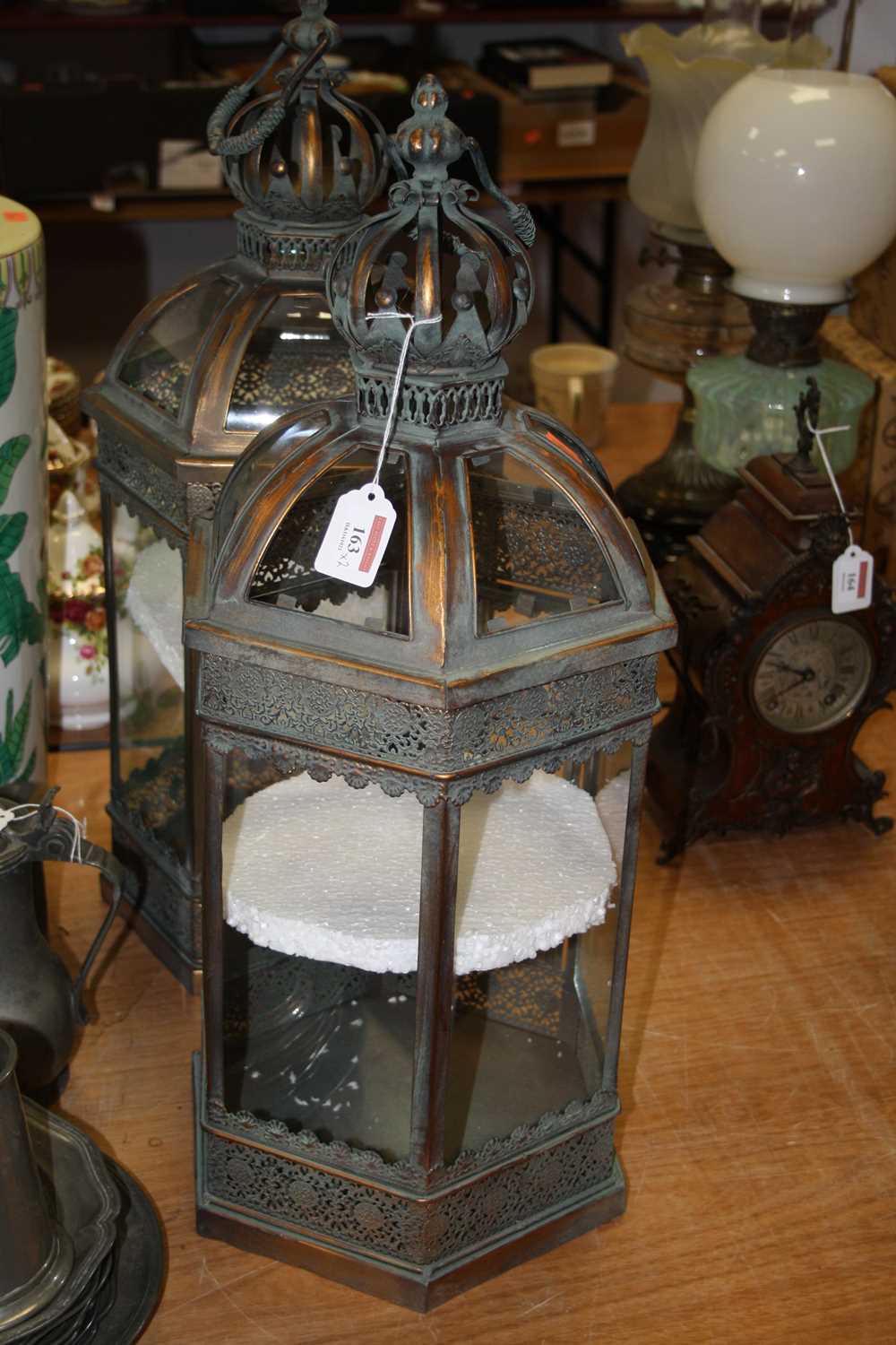 A pair of 20th century copper effect hanging lanterns, the crown finials above an hexagonal body, - Image 2 of 2