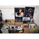A collection of Elvis Presley related memorabilia, to include framed photographs, books, ceramics,