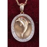 A yellow metal picture locket, of oval form, the cover decorated with a dolphin, all on finelink