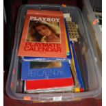 A collection of glamour calendars dating from the late 1960's to include Playboy Playmate examples.